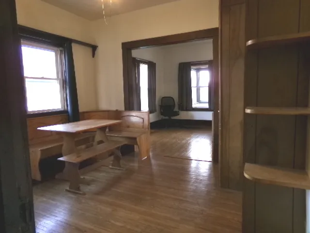 a view of livingroom with furniture wooden floor and window