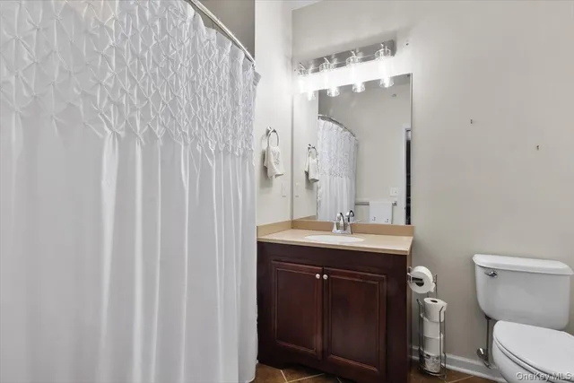 a view of storage and utility room with washer and dryer