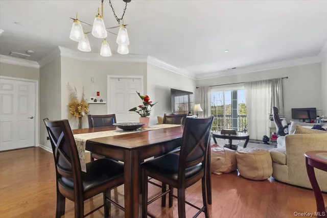 a bathroom with a tub sink toilet and shower