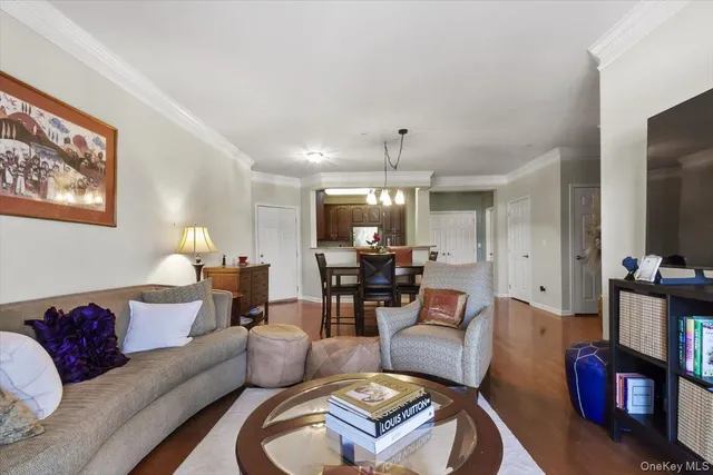 a kitchen with granite countertop wooden cabinets and stainless steel appliances