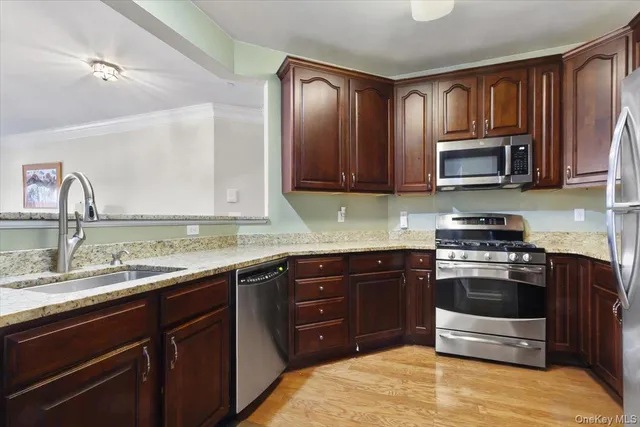 a kitchen with a table and chairs in it