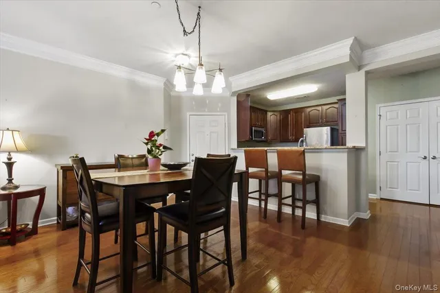 a bedroom with a bed and a television