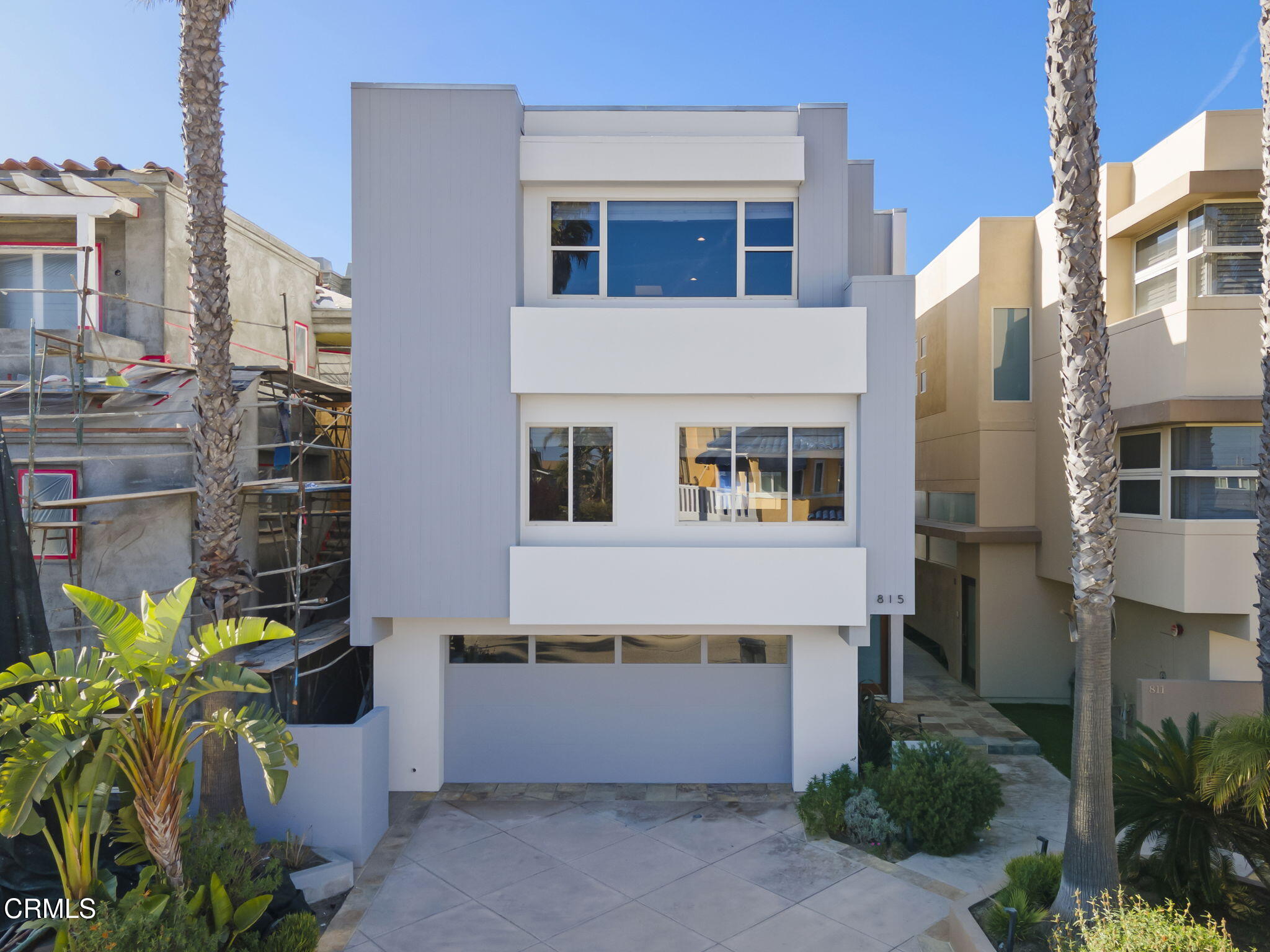 815 Mandalay Beach Road Oxnard, CA 93035 - Photo 13 of 15 a front view of a house with a garden