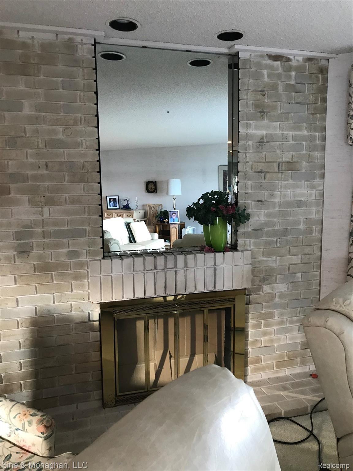 1715 River Road, Unit 31 St. Clair, MI 48079 - Photo 8 of 69 8 FIREPLACE 1715 RIVER #31.JPG
