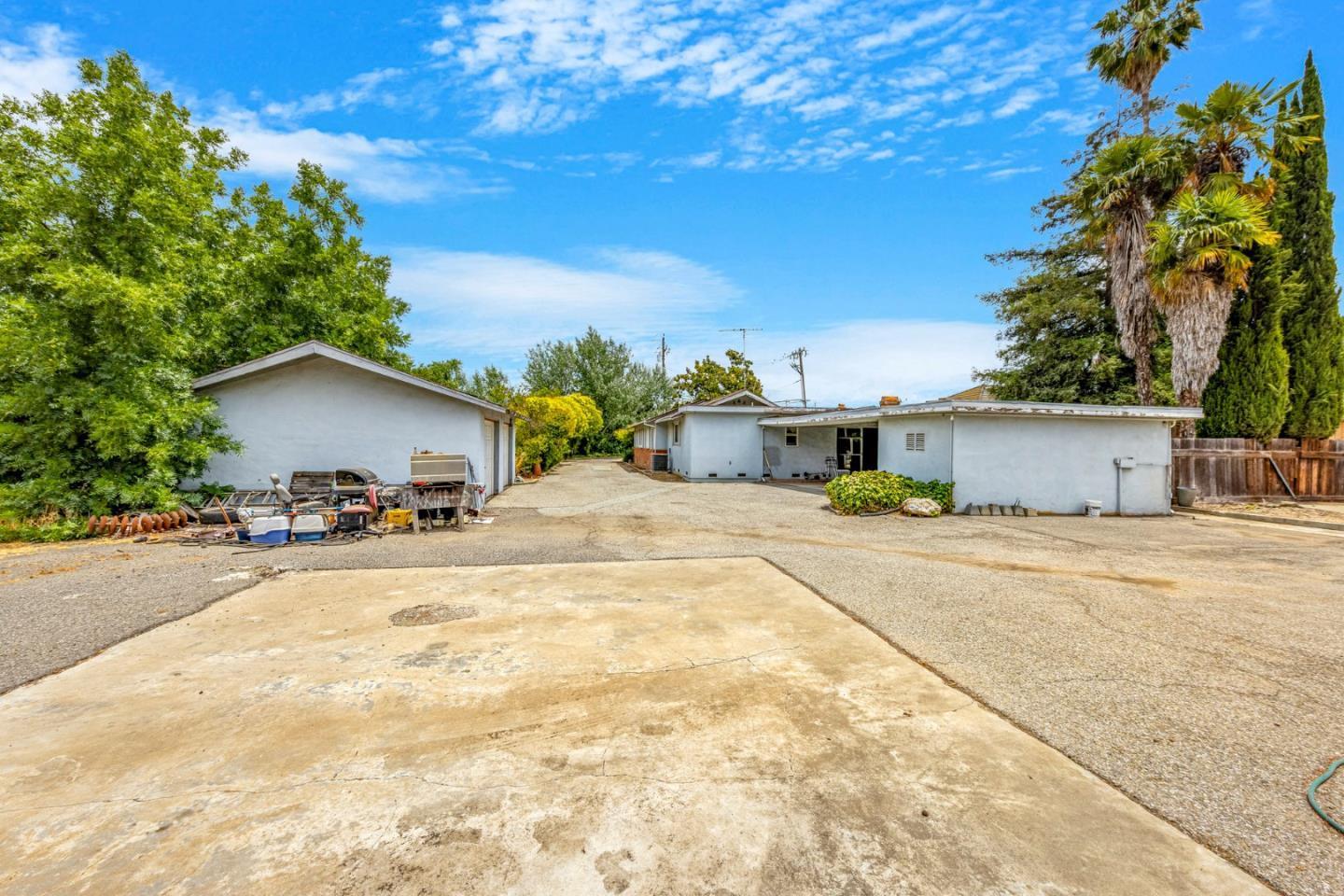 18455 Old Monterey Road Morgan Hill, CA 95037 - Photo 19 of 26 a front view of house with yard and trees in the background