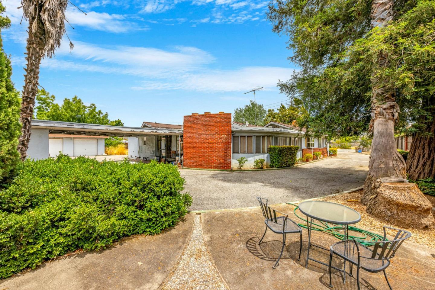 18455 Old Monterey Road Morgan Hill, CA 95037 - Photo 20 of 26 front view of a house with a yard