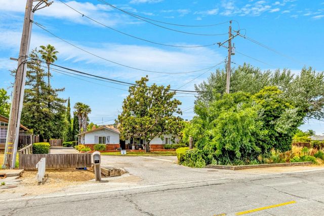 a building with trees in front of it
