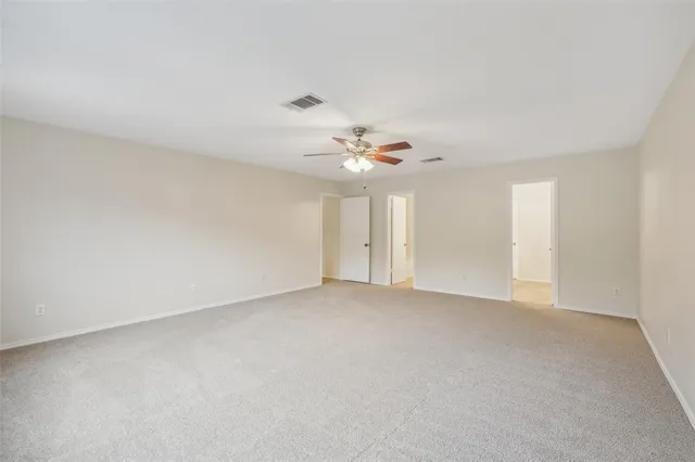 a bathroom with a sink a mirror and a vanity
