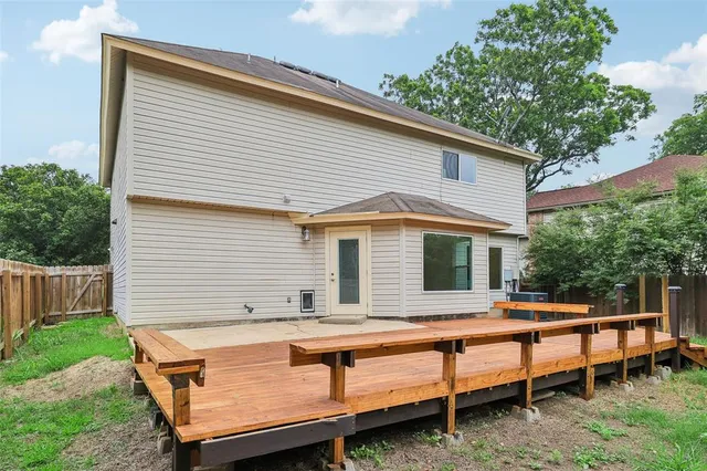 a front view of house with yard and outdoor seating