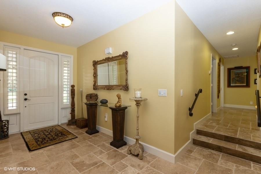 15 West High Point Road Sewall's Point, FL 34996 - Photo 3 of 24 a view of a livingroom with furniture and windows