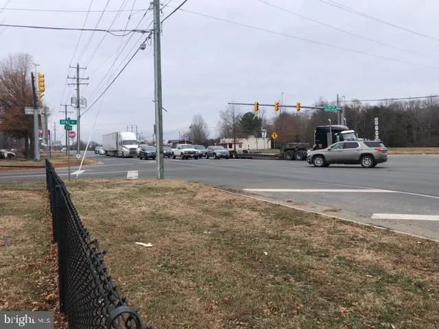 a view of a street with cars