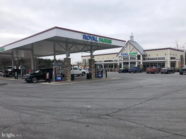 a view of a street with cars