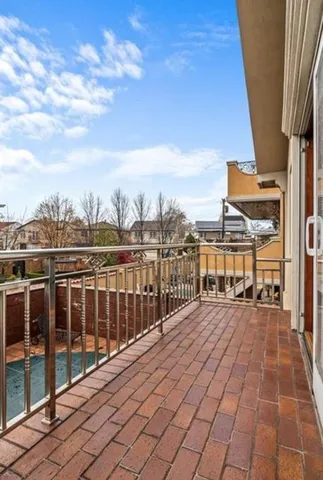 a view of a balcony with city view