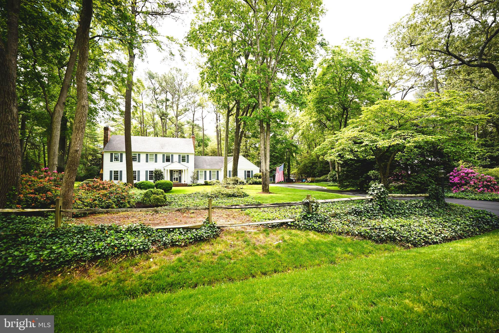29745 Jackson Road Salisbury, MD 21804 - Photo 5 of 77 a view of a house with a big yard and large trees
