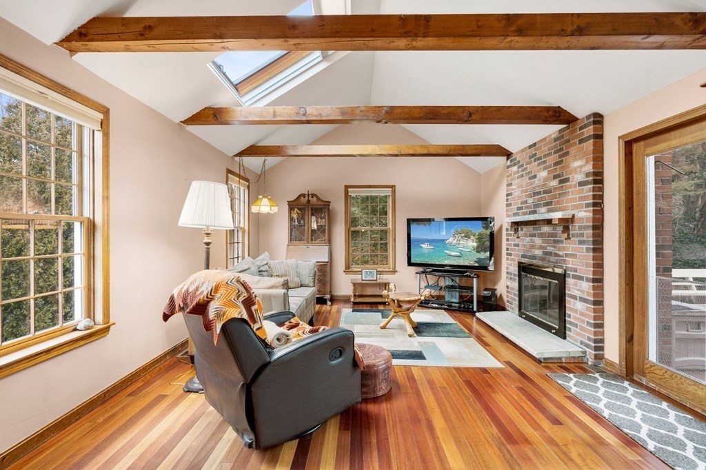 1 Beacon Hill Road Marblehead, MA 01945 - Photo 13 of 30 a living room with fireplace furniture and a flat screen tv