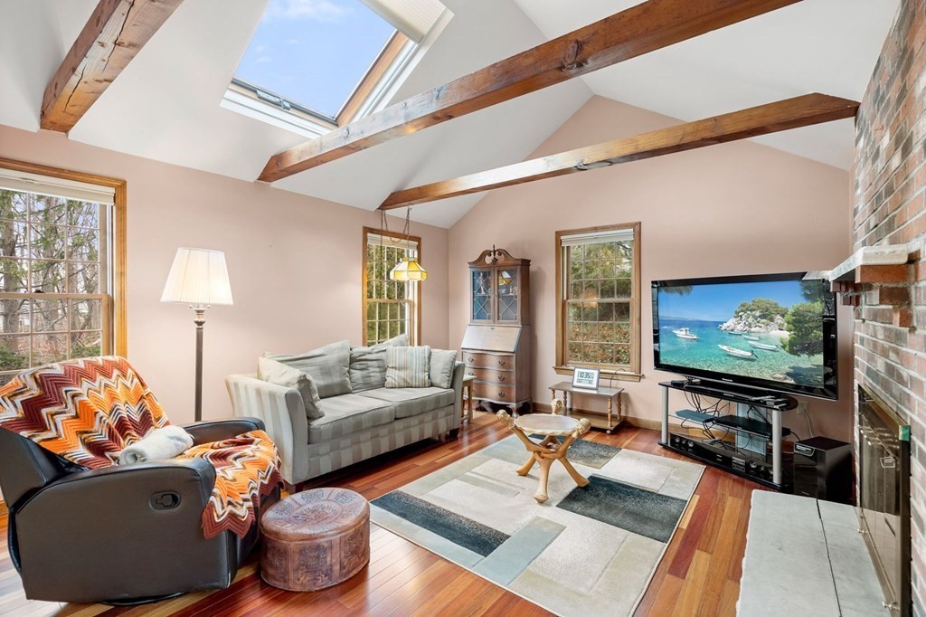 1 Beacon Hill Road Marblehead, MA 01945 - Photo 15 of 30 a living room with furniture and a flat screen tv