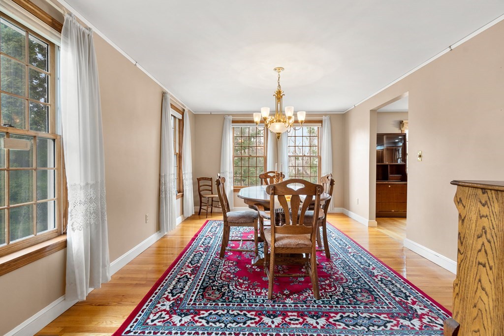 1 Beacon Hill Road Marblehead, MA 01945 - Photo 16 of 30 a view of a dining room with furniture window and wooden floor