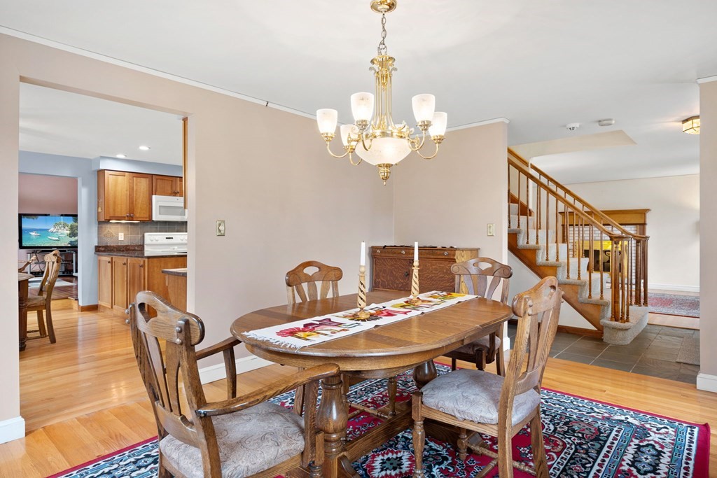 1 Beacon Hill Road Marblehead, MA 01945 - Photo 17 of 30 a view of a dining room with furniture and wooden floor