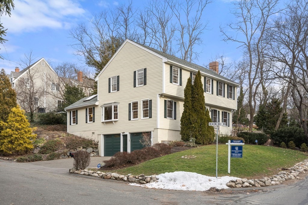 1 Beacon Hill Road Marblehead, MA 01945 - Photo 3 of 30 a view of a white house next to a yard with big trees
