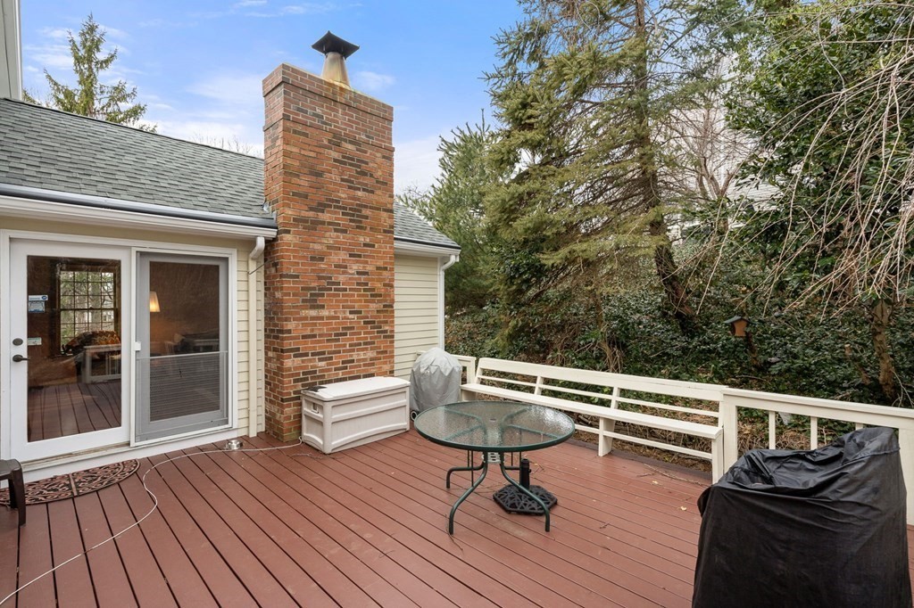 1 Beacon Hill Road Marblehead, MA 01945 - Photo 6 of 30 a balcony with wooden floor and outdoor seating