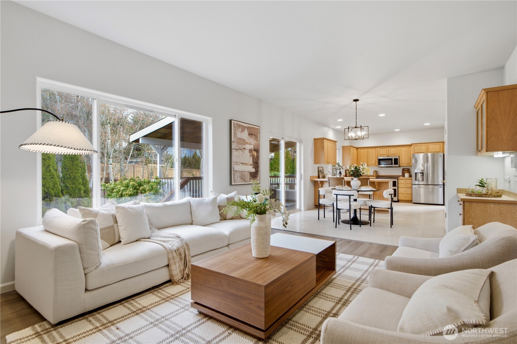 1611 242nd Street Southeast Bothell, WA 98021 - Photo 13 of 39 a living room with furniture and a large window