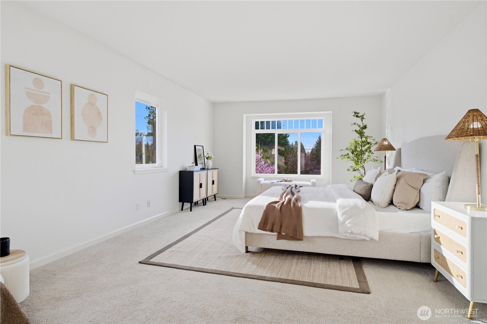 1611 242nd Street Southeast Bothell, WA 98021 - Photo 18 of 39 a bedroom with a bed and wooden floor