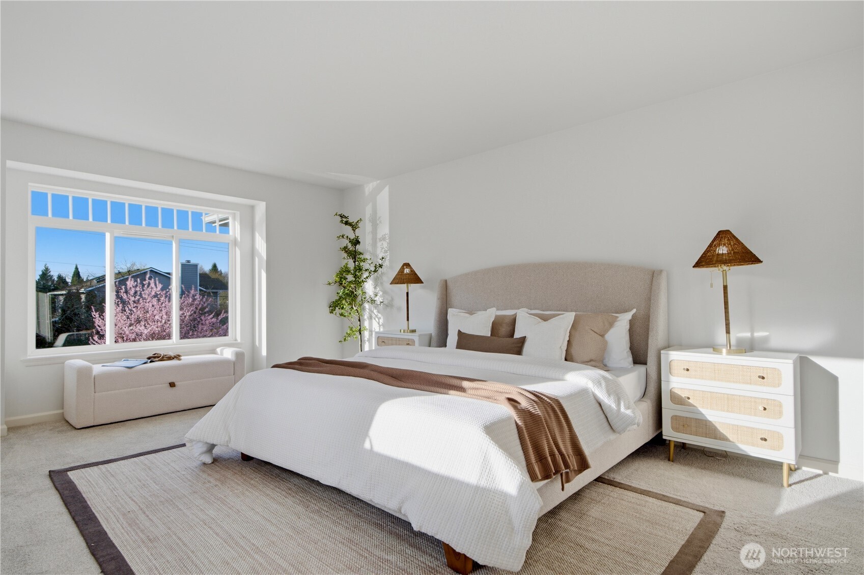 1611 242nd Street Southeast Bothell, WA 98021 - Photo 19 of 39 a bedroom with a large bed and a large window