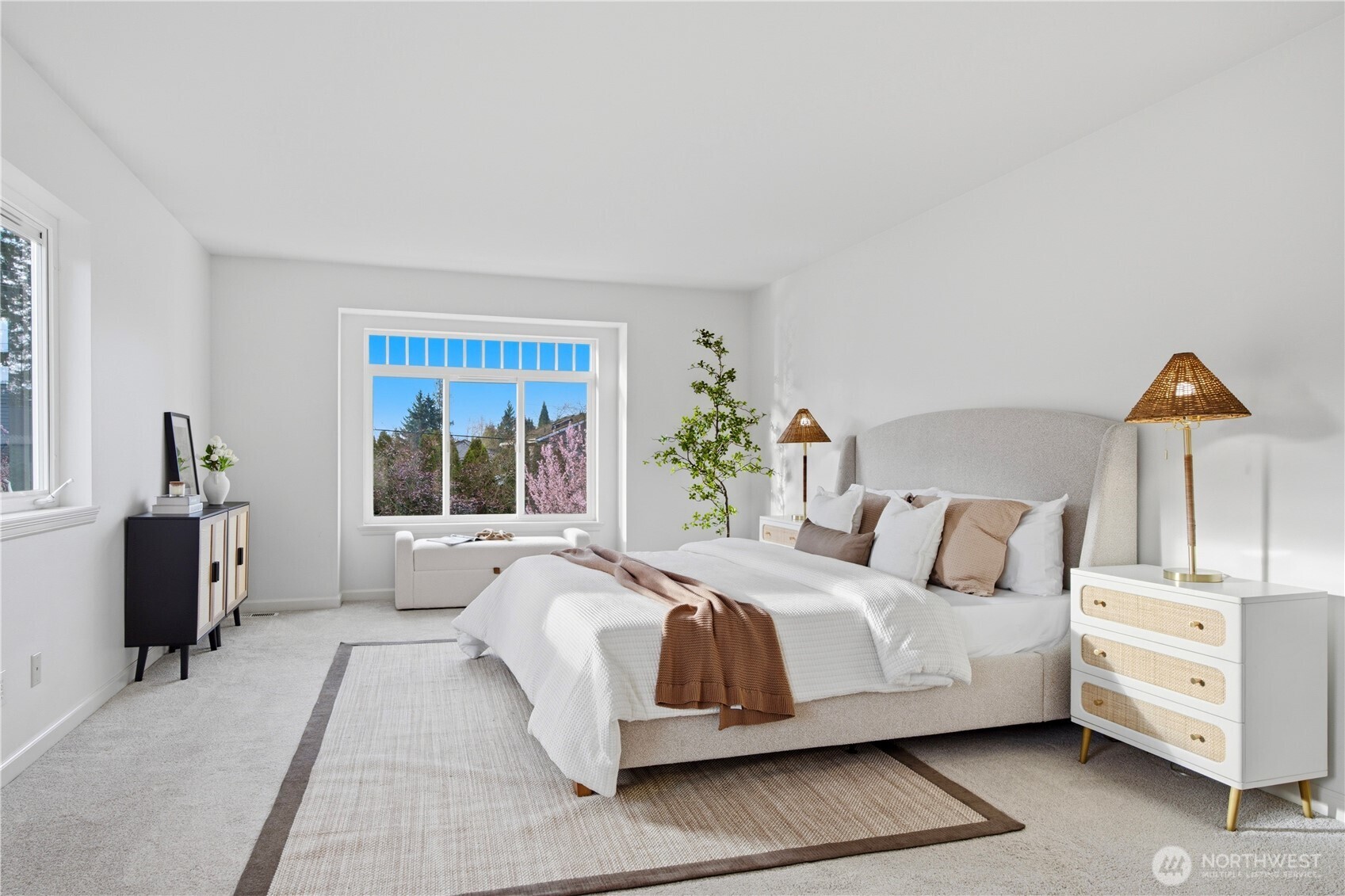 1611 242nd Street Southeast Bothell, WA 98021 - Photo 20 of 39 a bedroom with a large bed and a window