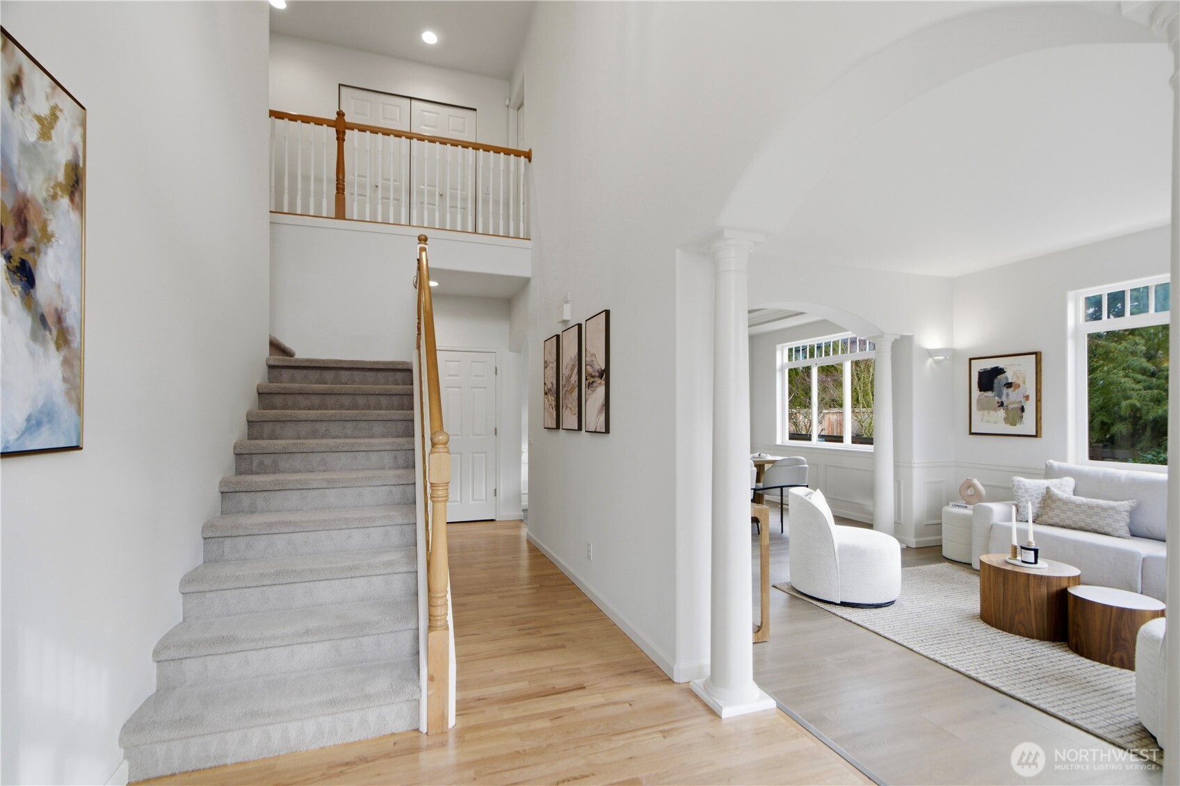 1611 242nd Street Southeast Bothell, WA 98021 - Photo 3 of 39 a view of a livingroom with furniture and staircase
