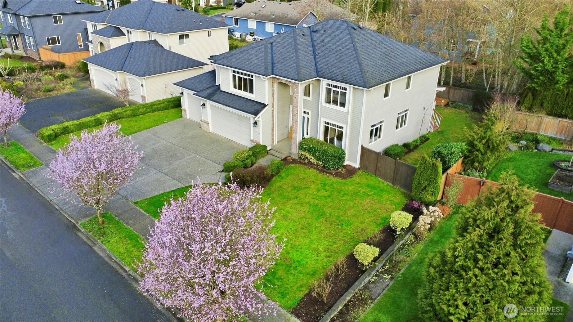 1611 242nd Street Southeast Bothell, WA 98021 - Photo 35 of 39 an aerial view of a house with a yard