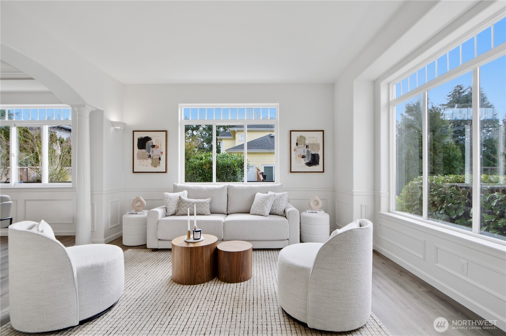 1611 242nd Street Southeast Bothell, WA 98021 - Photo 4 of 39 a living room with furniture and a large window