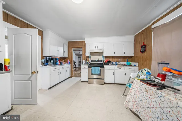 a workspace with furniture and a window