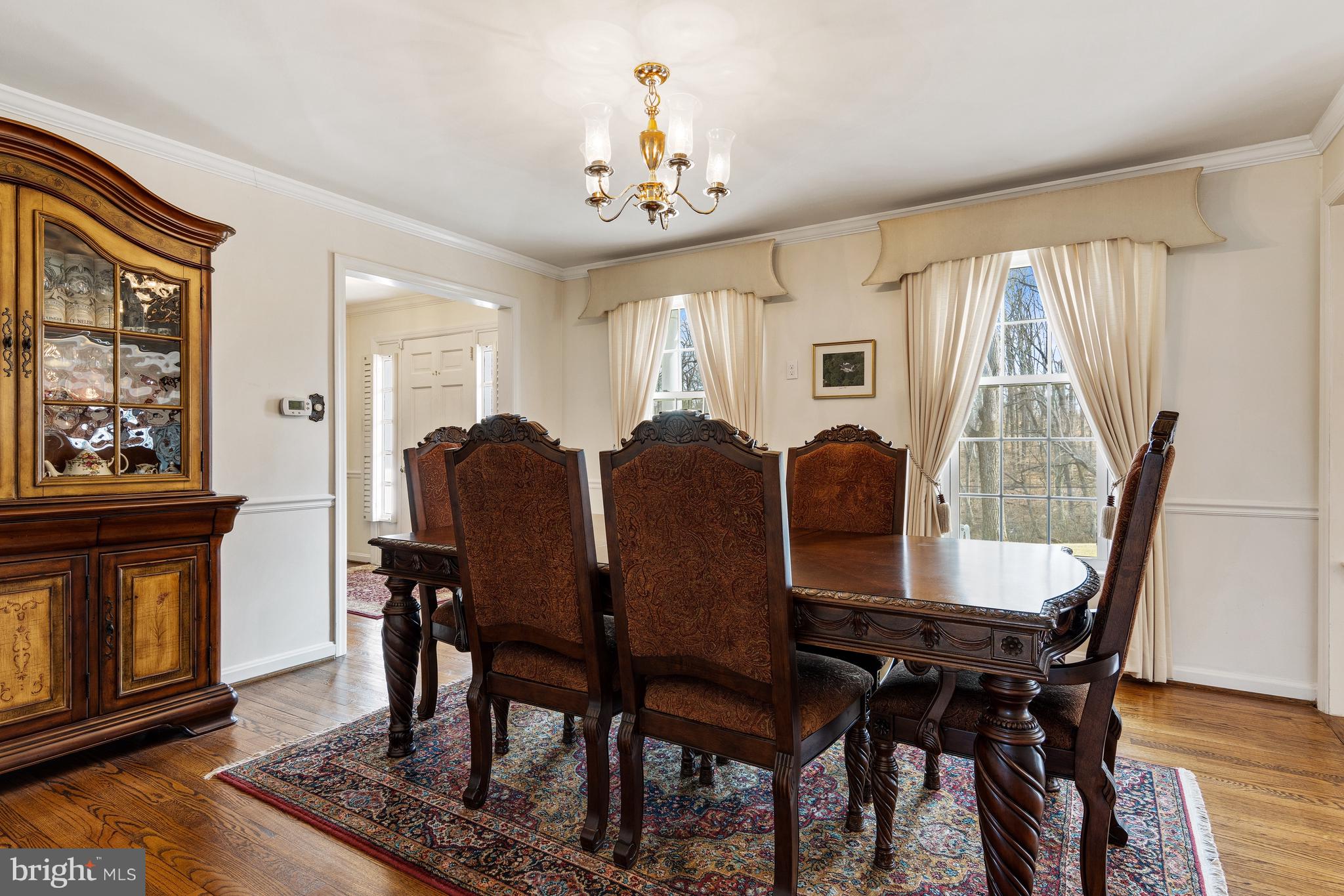 5004 Kennett Pike Wilmington, DE 19807 - Photo 12 of 37 a view of a dining room with furniture window and wooden floor