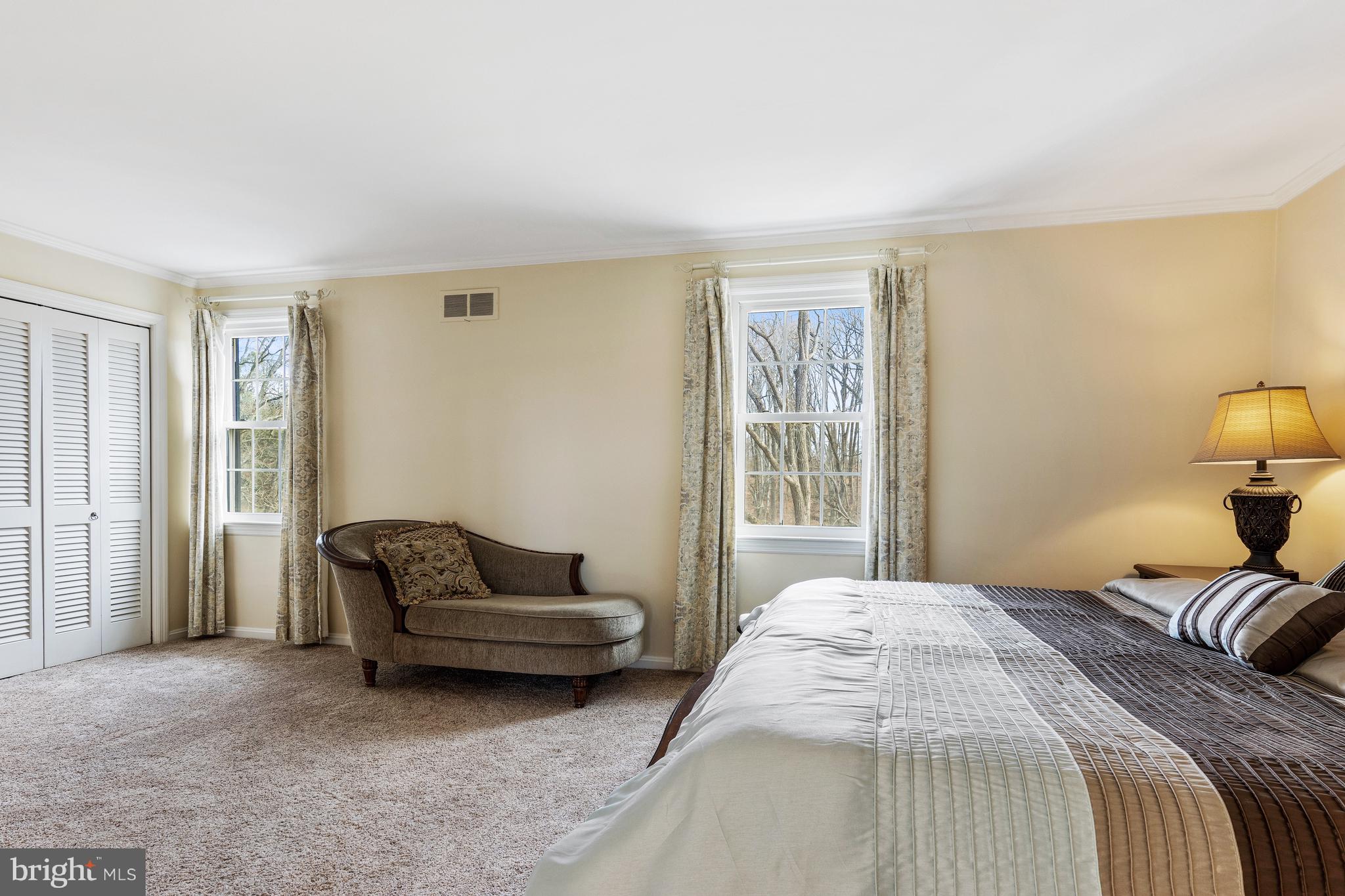 5004 Kennett Pike Wilmington, DE 19807 - Photo 25 of 37 a bedroom with a bed and couch