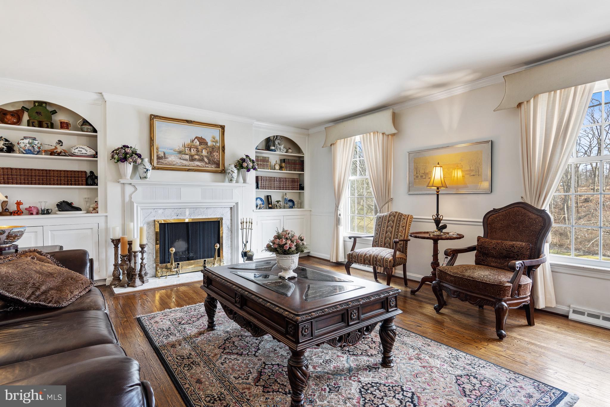 5004 Kennett Pike Wilmington, DE 19807 - Photo 10 of 37 a living room with furniture a fireplace and a window