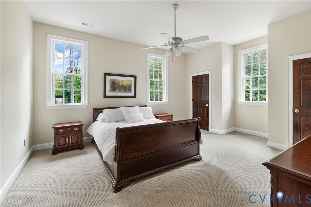 13173 Scotchtown Road Beaverdam, VA 23015 - Photo 41 of 65 a spacious bedroom with a bed and window
