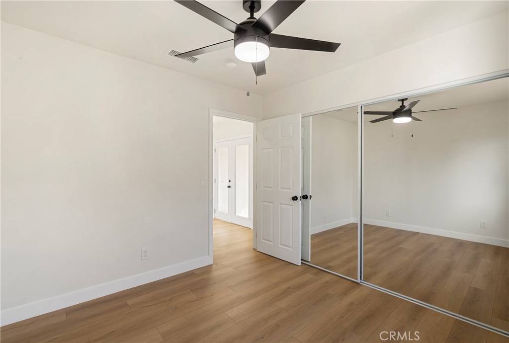 9130 Hargill Street Bellflower, CA 90706 - Photo 7 of 11 a view of an empty room with a window