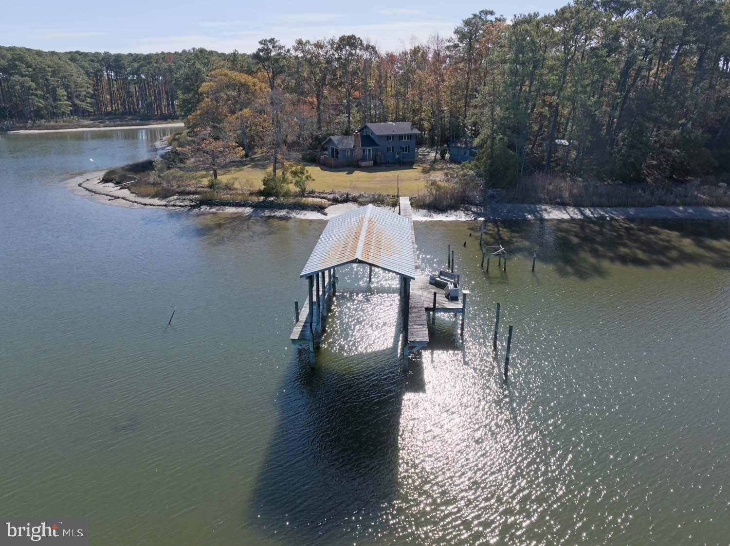 310 Brush Neck Road Susan, VA 23163 - Photo 46 of 70 a view of a lake with houses