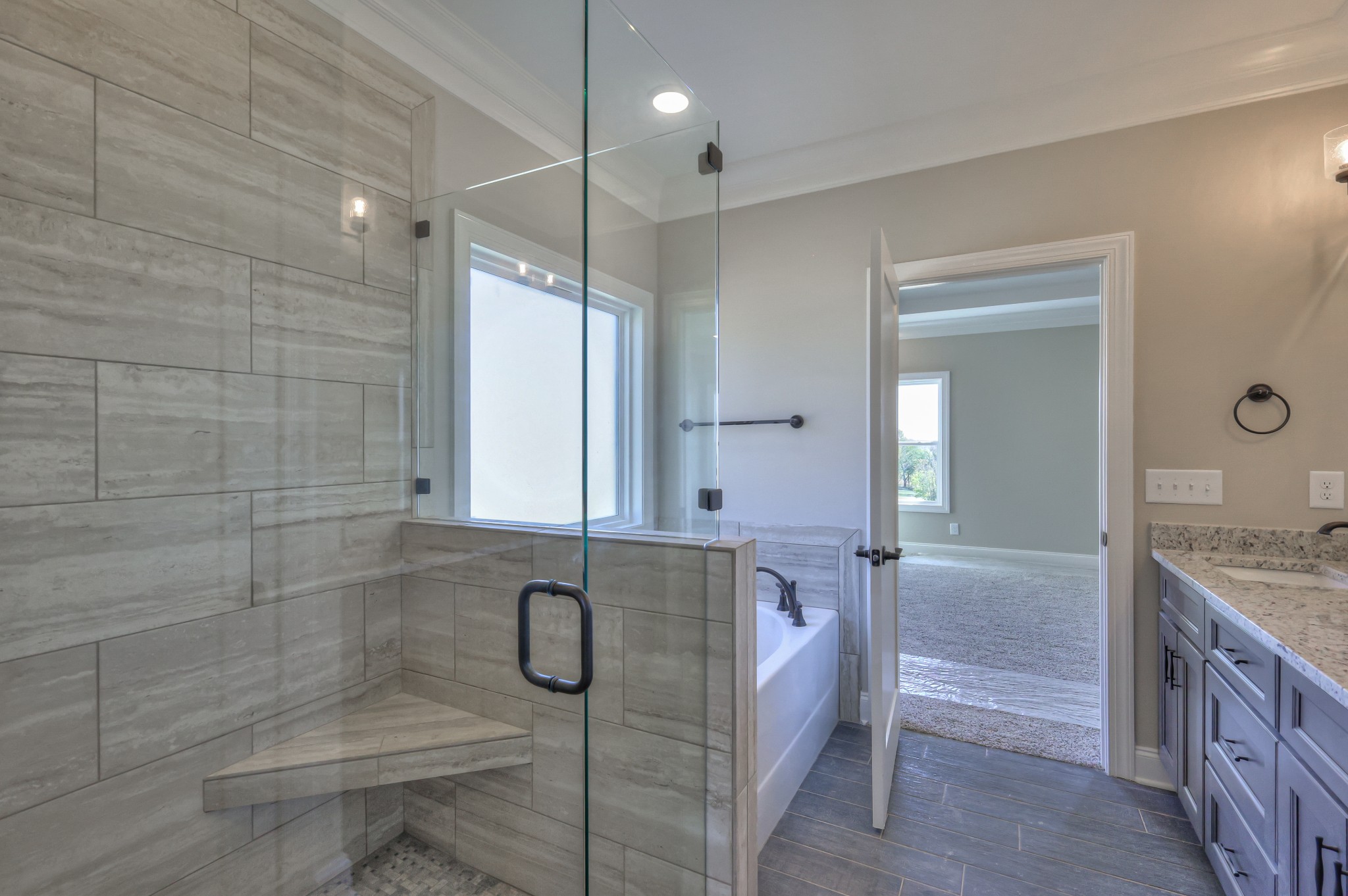 1875 Templow Road Bethpage, TN 37022 - Photo 13 of 49 a bathroom with a granite countertop sink a toilet and shower