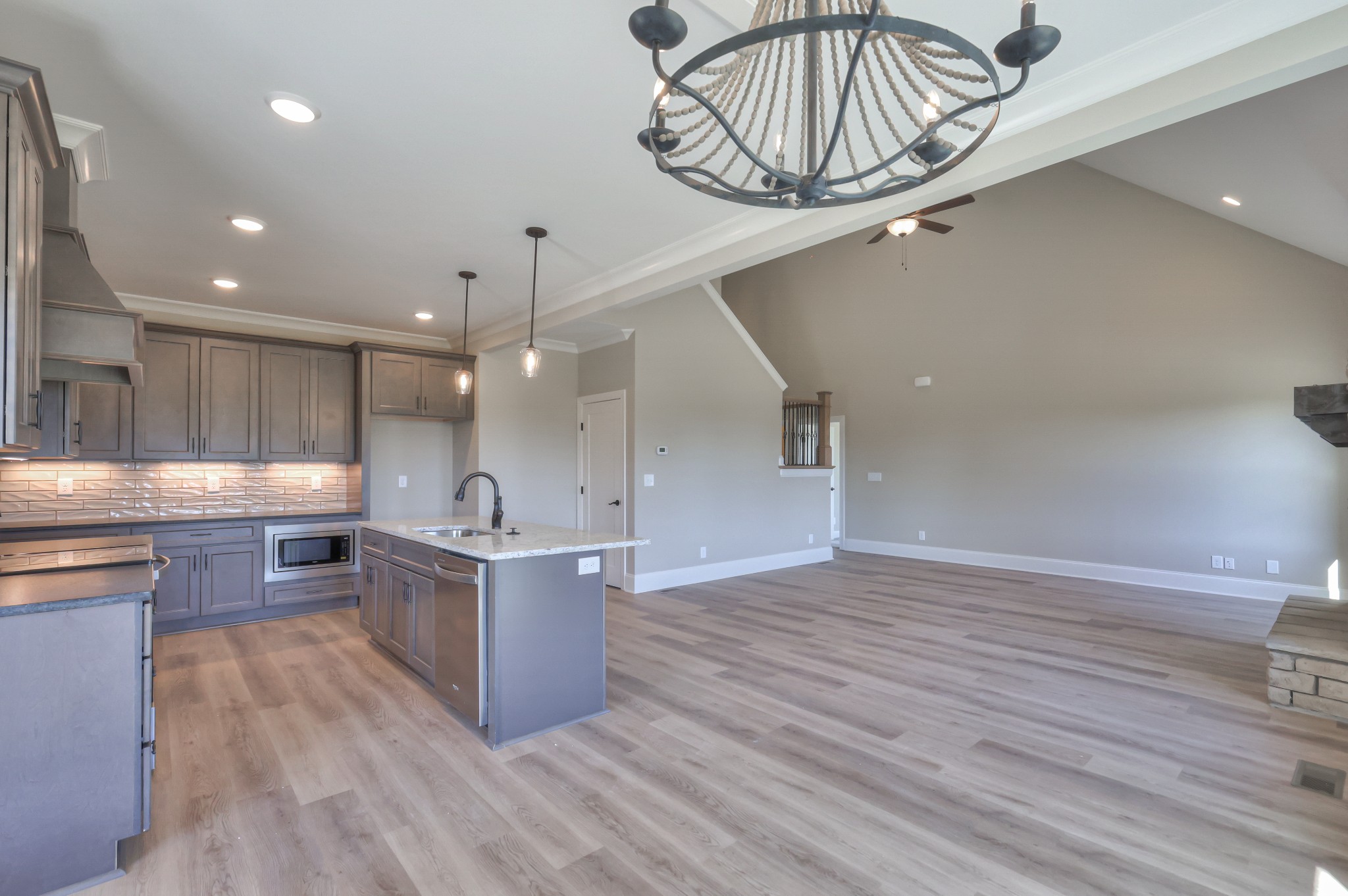 1875 Templow Road Bethpage, TN 37022 - Photo 32 of 49 a kitchen with stainless steel appliances kitchen island a large island in the center
