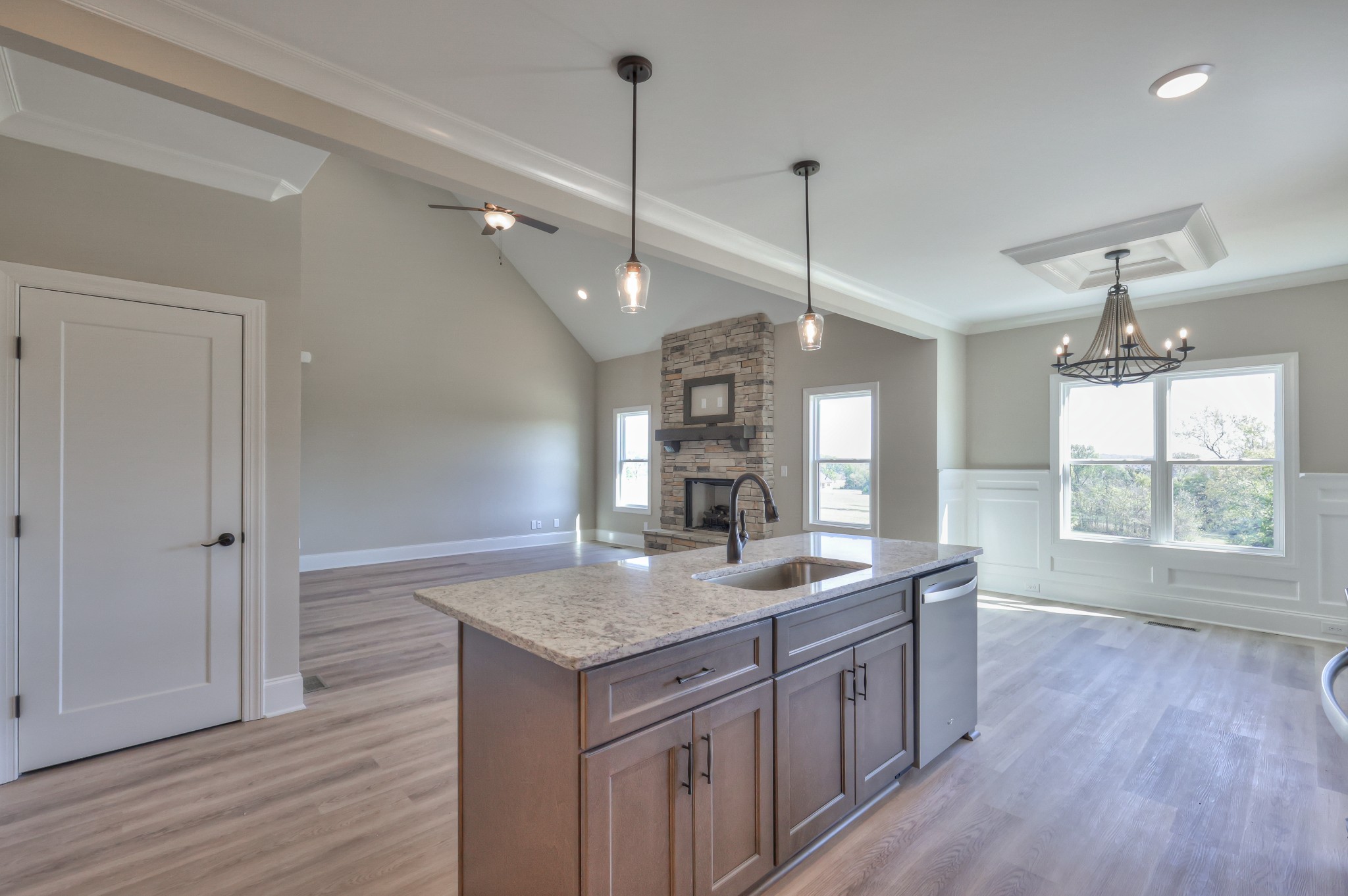 1875 Templow Road Bethpage, TN 37022 - Photo 34 of 49 a bathroom with a granite countertop sink window and a chandelier