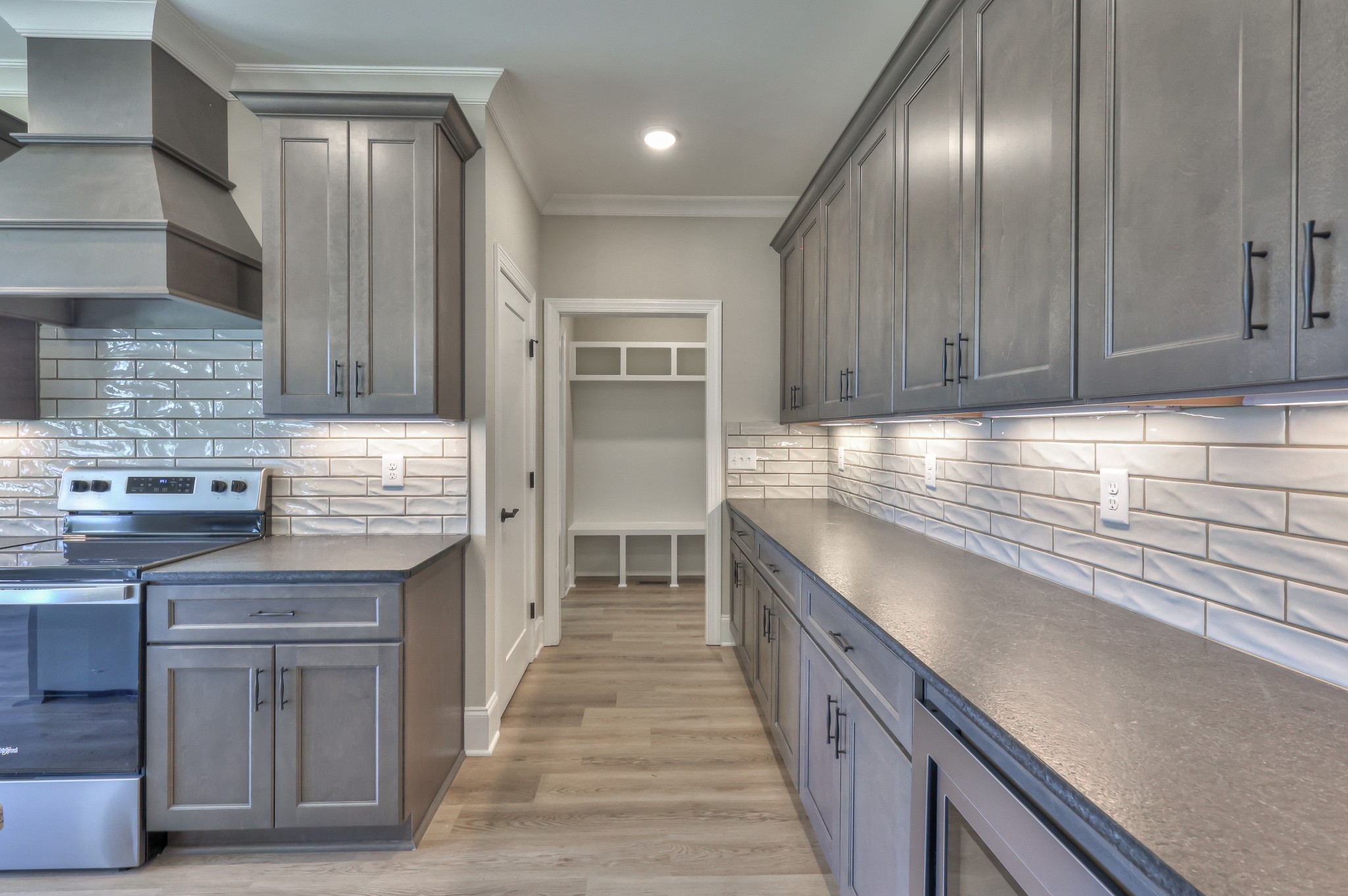 1875 Templow Road Bethpage, TN 37022 - Photo 36 of 49 a kitchen with granite countertop stainless steel appliances wooden cabinets and a sink