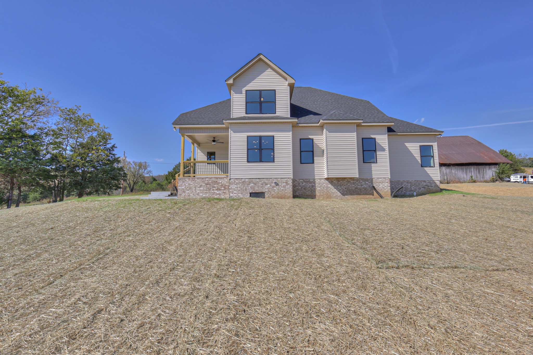 1875 Templow Road Bethpage, TN 37022 - Photo 43 of 49 a front view of a house with a yard