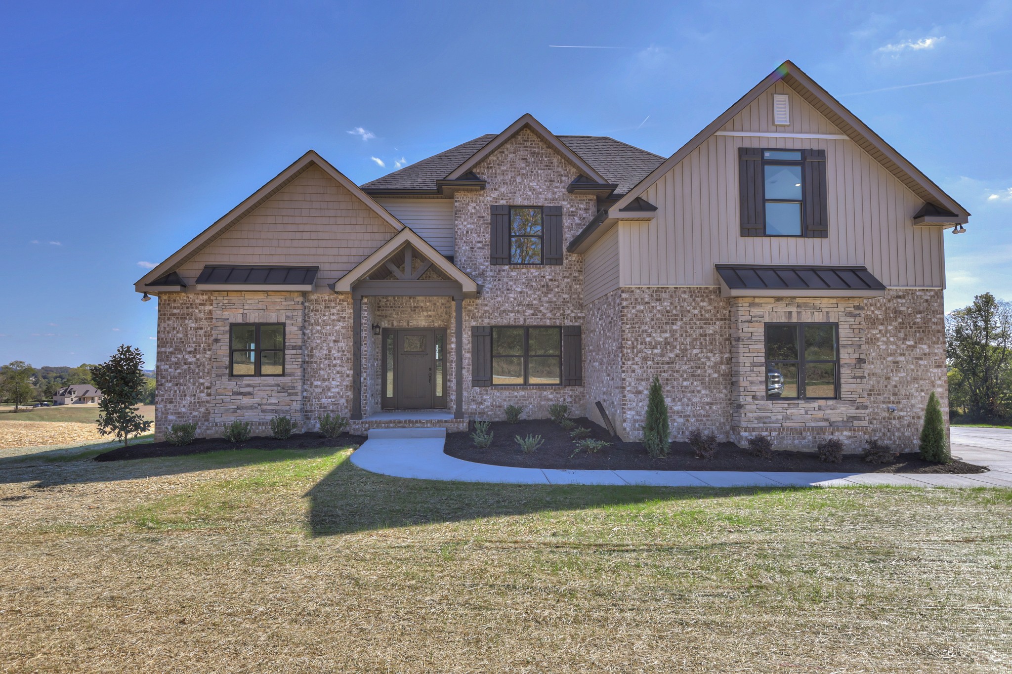 1875 Templow Road Bethpage, TN 37022 - Photo 46 of 49 a front view of a house with a yard
