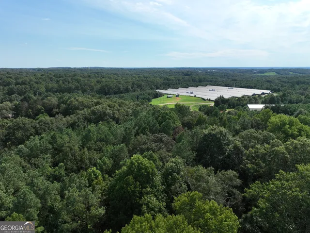 an aerial view of a city with lots of residential buildings