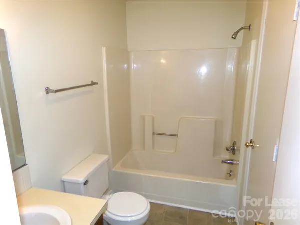 a bathroom with a toilet