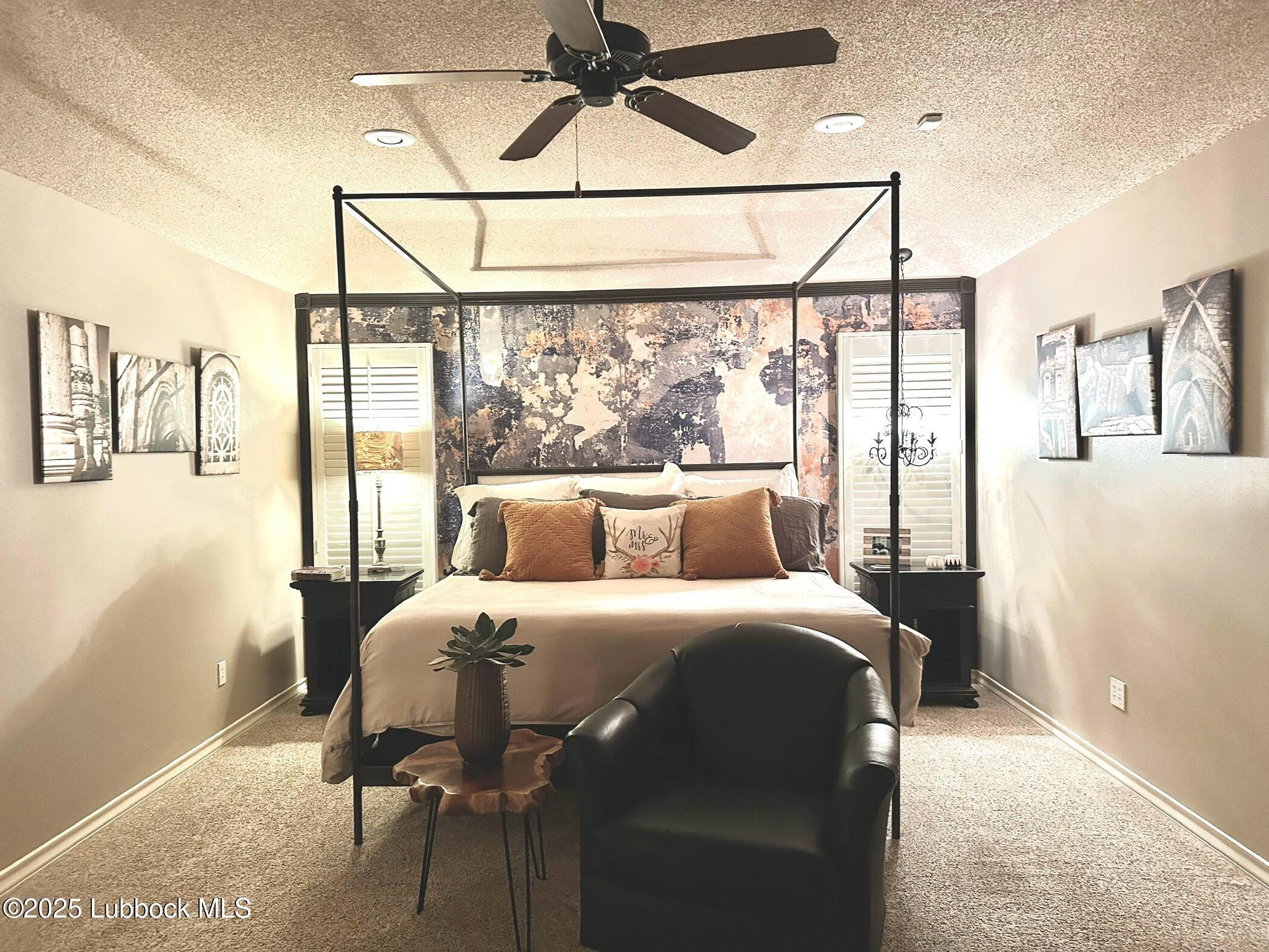 7206 76th Street Lubbock, TX 79407 - Photo 16 of 55 a bedroom with a bed and a window