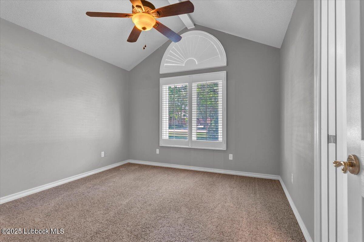 7206 76th Street Lubbock, TX 79407 - Photo 24 of 55 an empty room with windows and fan