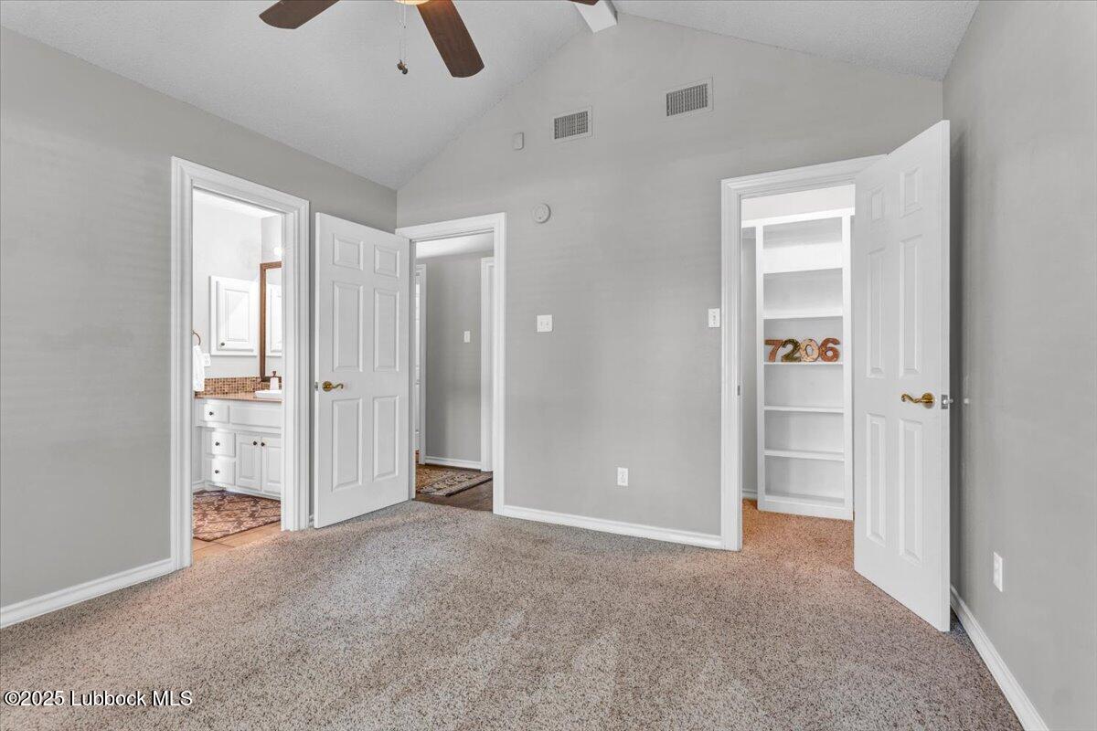 7206 76th Street Lubbock, TX 79407 - Photo 25 of 55 an empty room with closet and windows