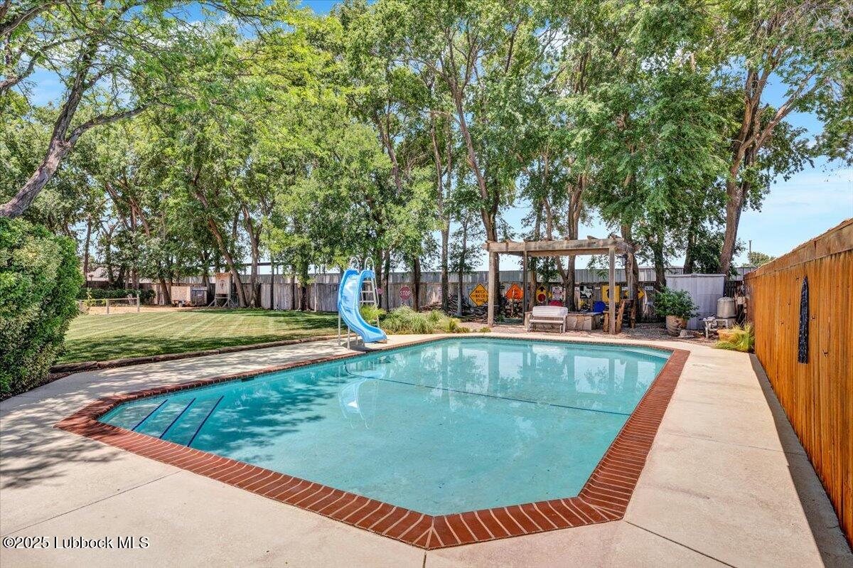 7206 76th Street Lubbock, TX 79407 - Photo 42 of 55 swimming pool view with seating space